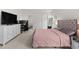 Spacious bedroom with vaulted ceilings boasts carpet floors, providing comfortable and stylish living at 145 Bounding Ln, Youngsville, NC 27596