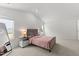 Bright bedroom features vaulted ceiling, carpet floors, and modern finishes to enhance appeal at 145 Bounding Ln, Youngsville, NC 27596