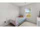 Bright bedroom with carpet floors is a cheerful and inviting space at 145 Bounding Ln, Youngsville, NC 27596