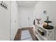 Inviting entryway featuring hardwood floors, neutral walls, and a decorative console table at 145 Bounding Ln, Youngsville, NC 27596