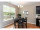 Charming dining area with natural light and view of backyard at 157 Lynn Dr, Clayton, NC 27520