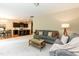 Open-concept living area with comfortable seating, a view of the kitchen, and a cozy atmosphere at 157 Lynn Dr, Clayton, NC 27520
