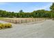 Outdoor horse arena surrounded by wooden fencing, ready for training at 1624 Hopkins Rd, Bahama, NC 27503