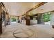 Bright horse stables featuring a star design floor, wood paneled walls, stalls and outdoor views at 1624 Hopkins Rd, Bahama, NC 27503