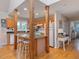 Open kitchen featuring a breakfast bar, wood cabinets, and ample counter space at 1624 Hopkins Rd, Bahama, NC 27503