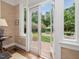 An inviting patio with garden views is accessed via glass patio doors and has plenty of sunlight at 1624 Hopkins Rd, Bahama, NC 27503
