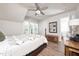 Charming bedroom with a vintage-style quilt, a rustic wood chest, and plenty of natural light at 1705 Main Divide Dr, Wake Forest, NC 27587