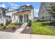 Attractive home with a manicured lawn, front porch, and tasteful landscaping at 1705 Main Divide Dr, Wake Forest, NC 27587