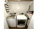 Efficient laundry room equipped with a washer and dryer for modern convenience at 1705 Main Divide Dr, Wake Forest, NC 27587