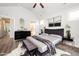 Main bedroom with sleek furniture, modern decor, and cozy accents at 1705 Main Divide Dr, Wake Forest, NC 27587