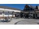 Outdoor tables with umbrellas offer a nice place to sit outside this clubhouse at 1905 Gazania Dr, Fuquay Varina, NC 27526
