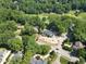 Home under construction nestled in the green neighborhood at 1925 Hunting Ridge Rd, Raleigh, NC 27615