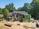 Modern two-story home under construction with brick accents and a well-maintained yard at 1925 Hunting Ridge Rd, Raleigh, NC 27615
