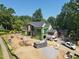 New home exterior featuring modern design elements and beautiful surroundings at 1925 Hunting Ridge Rd, Raleigh, NC 27615