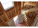 Interior framing of a home featuring staircase and windows, awaiting completion and customization at 1925 Hunting Ridge Rd, Raleigh, NC 27615
