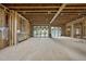 A spacious living room is under construction, featuring large windows and an open-concept design at 1925 Hunting Ridge Rd, Raleigh, NC 27615