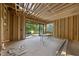 Unfinished patio featuring an open design and natural wood framing, ready for customization at 1925 Hunting Ridge Rd, Raleigh, NC 27615