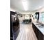 Open layout features dining area with hardwood floors connecting to the kitchen at 201 Joe Gibson Dr, Gibsonville, NC 27249