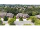 Lovely landscaped brick home features mature trees and a well-manicured lawn in established neighborhood at 2012 Muirfield Ct, Elon, NC 27244