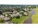 Beautifully landscaped home and yard near the lake at 2012 Muirfield Ct, Elon, NC 27244