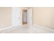 Bedroom with doorway and neutral walls and carpet at 2012 Muirfield Ct, Elon, NC 27244