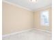 Bright bedroom features neutral walls, carpet, and large window at 2012 Muirfield Ct, Elon, NC 27244