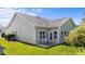 Well-maintained backyard featuring a cozy patio and lush green lawn at 2117 Crockett Ridge Rd, Fuquay Varina, NC 27526