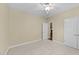 Spacious bedroom with carpet, large closet, and connecting doorway at 2117 Crockett Ridge Rd, Fuquay Varina, NC 27526