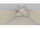 The carpeted bonus room offers extra square footage, neutral paint, and base trim at 2117 Crockett Ridge Rd, Fuquay Varina, NC 27526