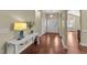 Spacious entryway featuring hardwood floors, arched hallways, and bright, neutral paint at 2117 Crockett Ridge Rd, Fuquay Varina, NC 27526