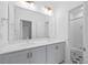 Bathroom with double sinks, modern fixtures, and a shower at 212 Aubey Ln, Wake Forest, NC 27587