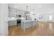 Modern kitchen with stainless steel appliances, ample counter space, and open layout at 212 Aubey Ln, Wake Forest, NC 27587