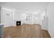 Open floor plan with fireplace, hardwood floors, and natural light at 212 Aubey Ln, Wake Forest, NC 27587