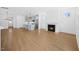 Spacious living room with fireplace, hardwood floors, and ample natural light at 212 Aubey Ln, Wake Forest, NC 27587
