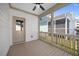 Spacious screened-in porch with a ceiling fan and wood flooring at 212 Aubey Ln, Wake Forest, NC 27587