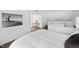 View of the bedroom with hardwood floors and a relaxing ambiance at 218 Lafayette Rd, Raleigh, NC 27604