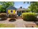 Charming home with blue siding, yellow shutters, and a welcoming front porch at 218 Lafayette Rd, Raleigh, NC 27604
