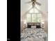 Cozy bedroom with lots of natural light, a dormer window, and neutral tones at 2212 Oxford Hills Dr, Raleigh, NC 27608