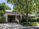 Charming two-story home with a covered front porch, lush landscaping, and inviting curb appeal at 2212 Oxford Hills Dr, Raleigh, NC 27608