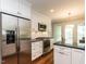 Modern kitchen with stainless steel appliances and granite countertops, ideal for cooking and entertaining at 2212 Oxford Hills Dr, Raleigh, NC 27608