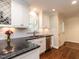 Modern kitchen featuring updated appliances and a seamless layout at 2212 Oxford Hills Dr, Raleigh, NC 27608