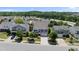 Neighborhood aerial view showcases the home's location and surrounding trees at 2412 Averon Dr, Fuquay Varina, NC 27526