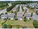 Aerial view of the home and neighborhood with well-maintained lawns and mature trees at 2412 Averon Dr, Fuquay Varina, NC 27526