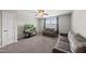Bedroom with a ceiling fan, carpet flooring, and a cozy seating area at 2412 Averon Dr, Fuquay Varina, NC 27526
