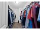 Walk-in closet featuring carpet and shelving for optimal storage at 2412 Averon Dr, Fuquay Varina, NC 27526