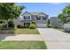 Charming two-story home with a well-manicured front yard and a two-car garage at 2412 Averon Dr, Fuquay Varina, NC 27526