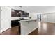 Stylish kitchen with a granite island, stainless steel appliances, and ample cabinet space at 2412 Averon Dr, Fuquay Varina, NC 27526