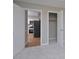 Bedroom view with neutral carpet, an ensuite entrance and closet, providing convenient storage at 2708 Sundial Cir, Durham, NC 27704