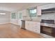 Bright and modern kitchen with stainless steel appliances and updated countertops at 2708 Sundial Cir, Durham, NC 27704