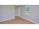 Living room featuring wood floors and natural light at 2708 Sundial Cir, Durham, NC 27704